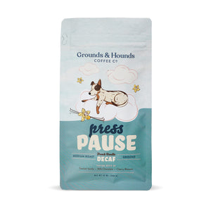 12 ounce press pause decaf vanilla coffee bag with dog in the clouds design
