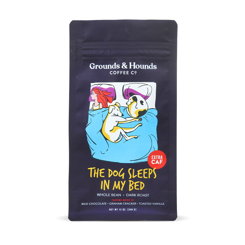 coffee bag with cartoon design of girl in bed with dogs