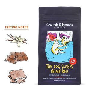 coffee bag with cartoon design of girl in bed with dogs