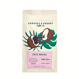 12 ounce beige coffee bag with coconut and tropical leaves on the design
