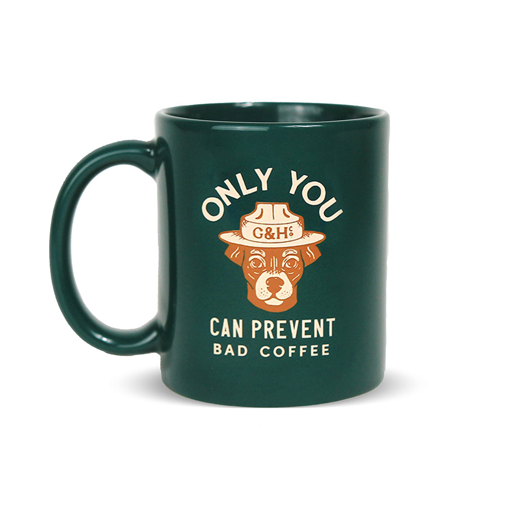 green mug with brown dog design