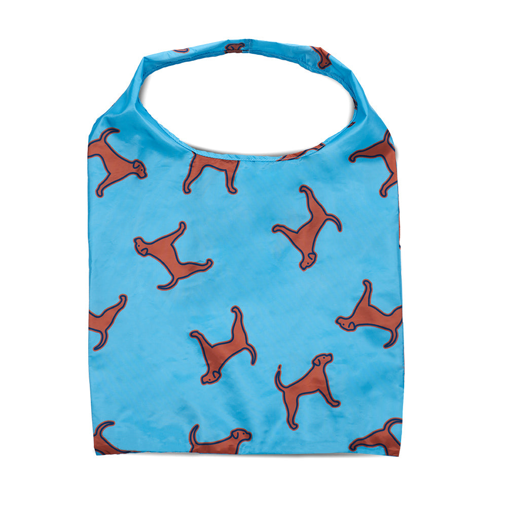 light blue packable tote bag with dog print