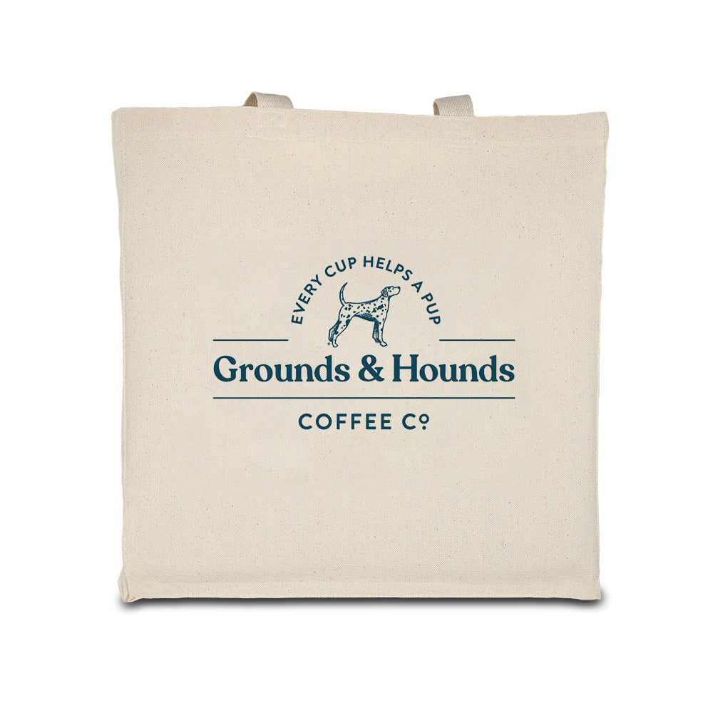 natural canvas tote with grounds & hounds logo on front center