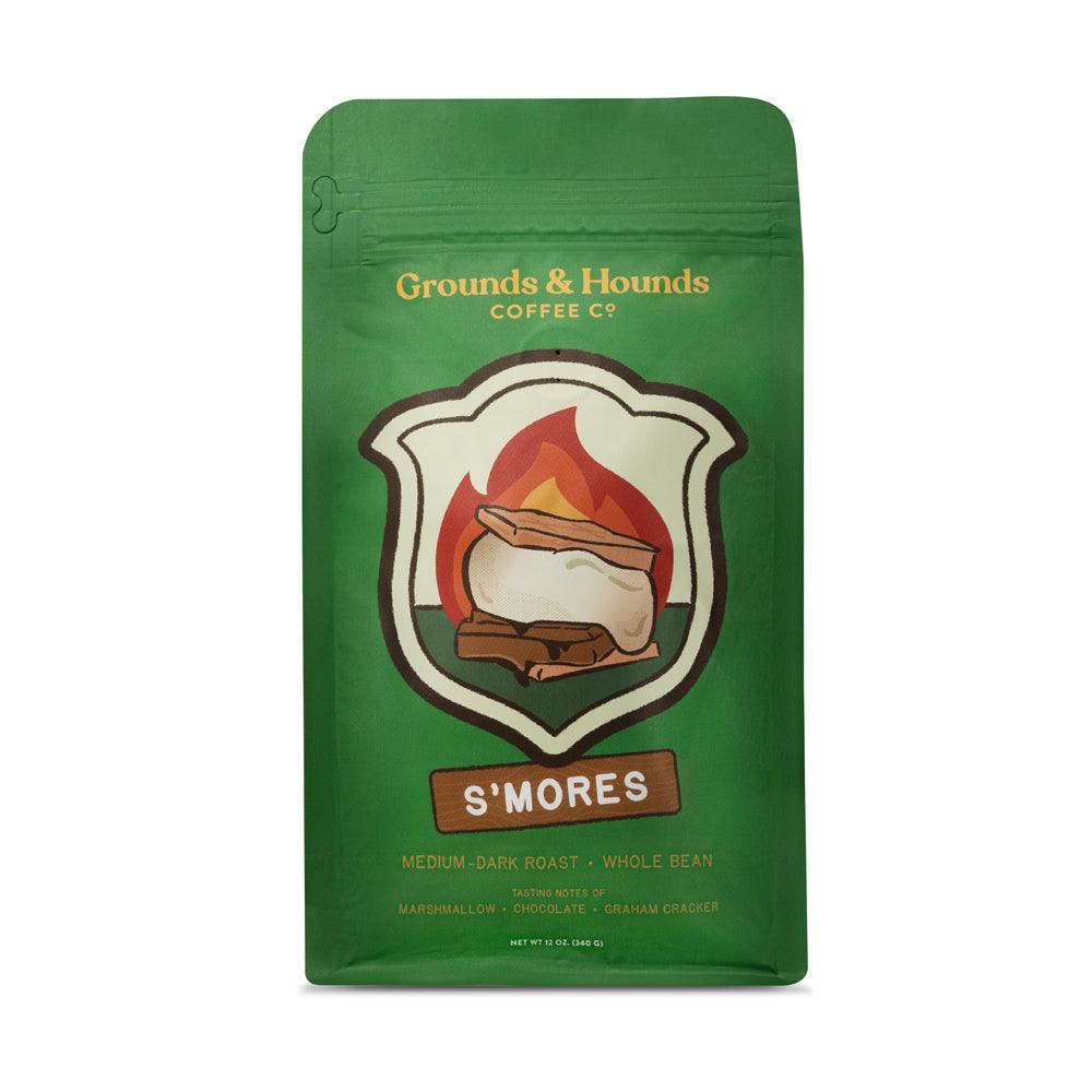 Green 12 ounce coffee bag with s'mores design in campfire