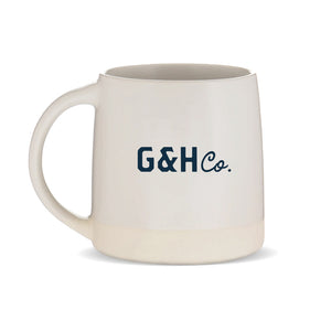 beige ceramic mug with G&Hco logo