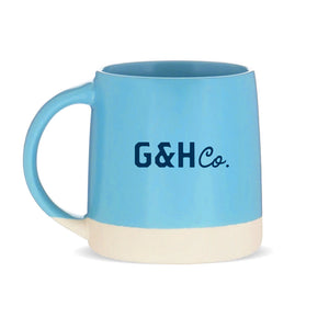 light blue ceramic mug with G&Hco logo